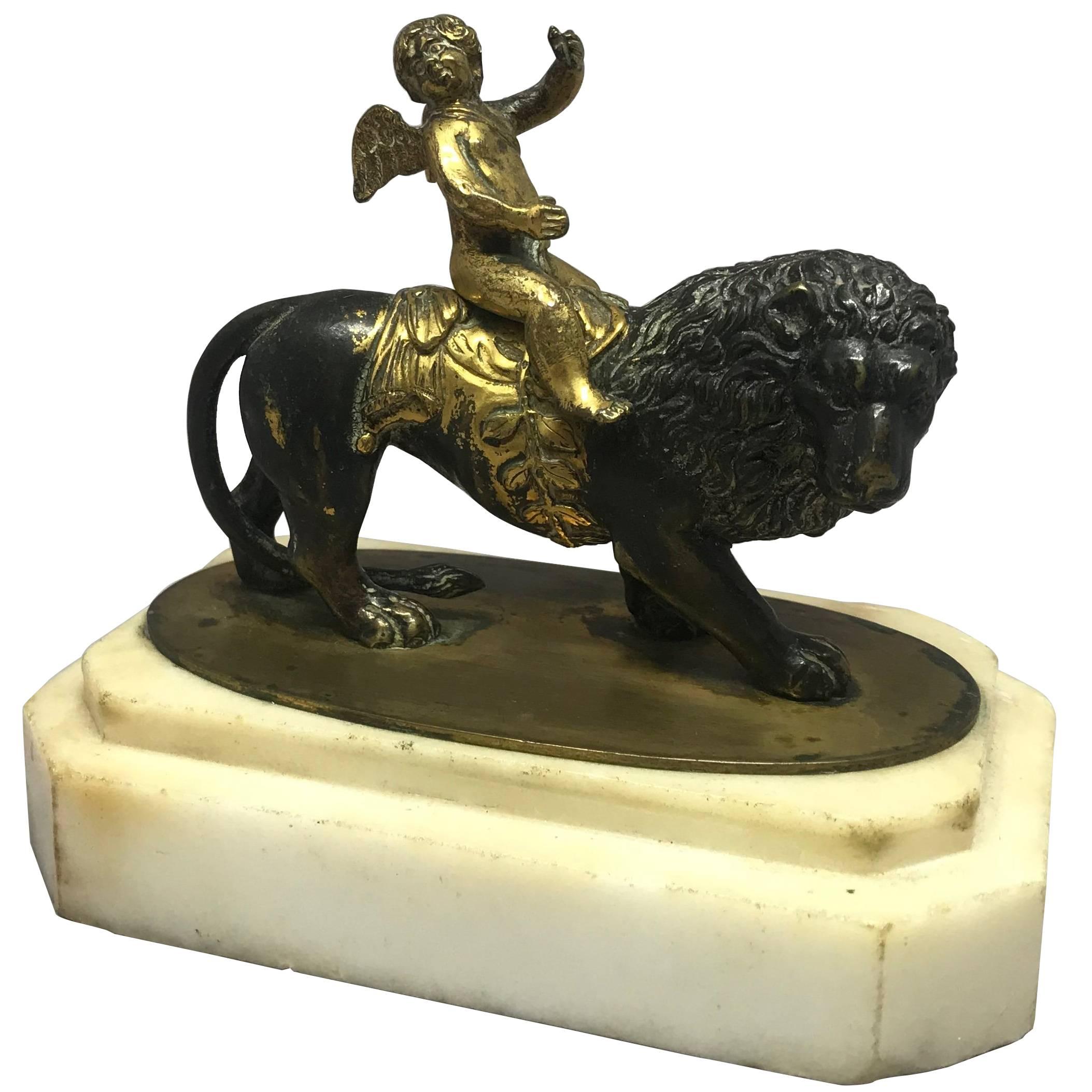English Regency Gilt Bronze Cupid and Lion Paper Weight Sculpture