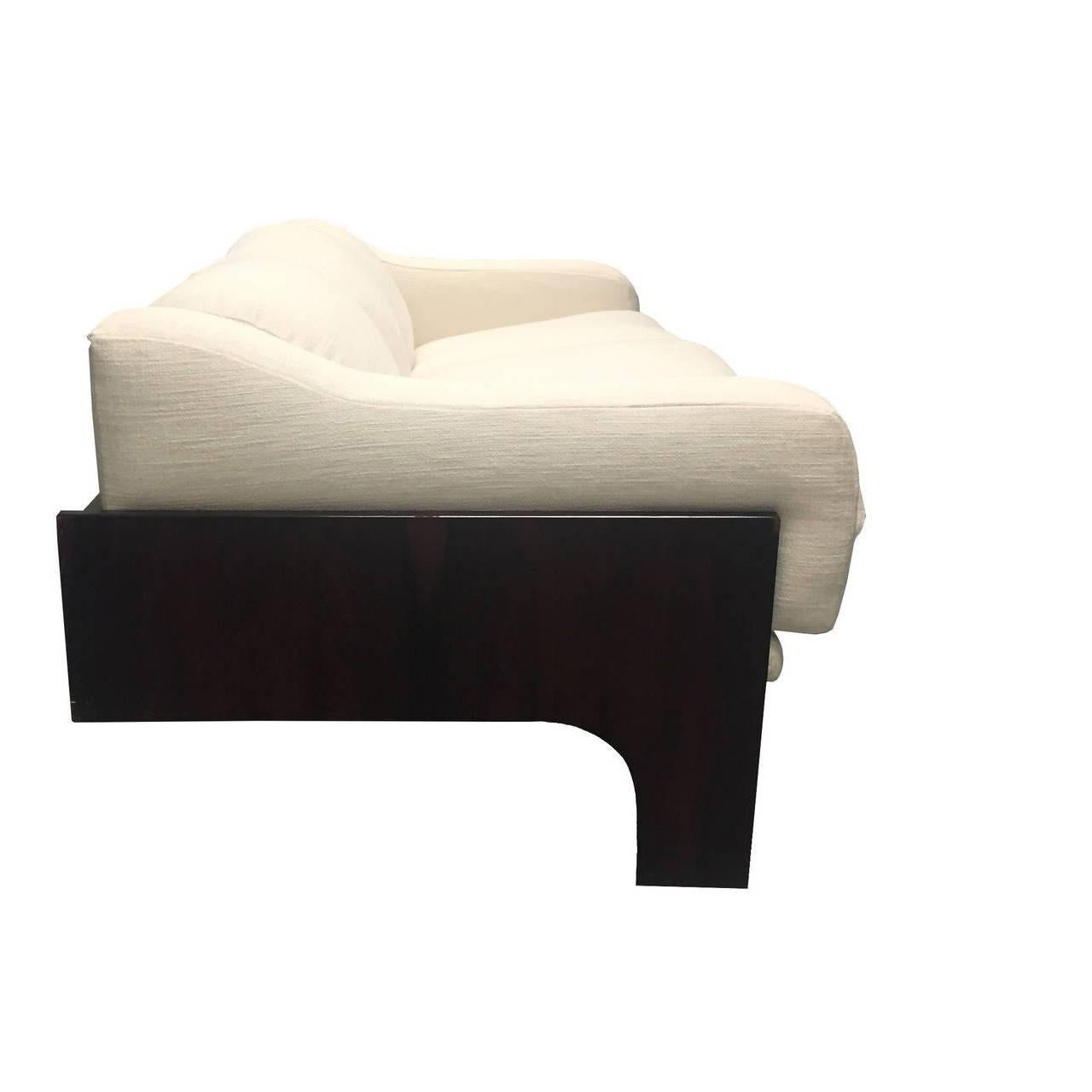 Claudio Salocchi for Sormani rosewood sofa in white upholstery.