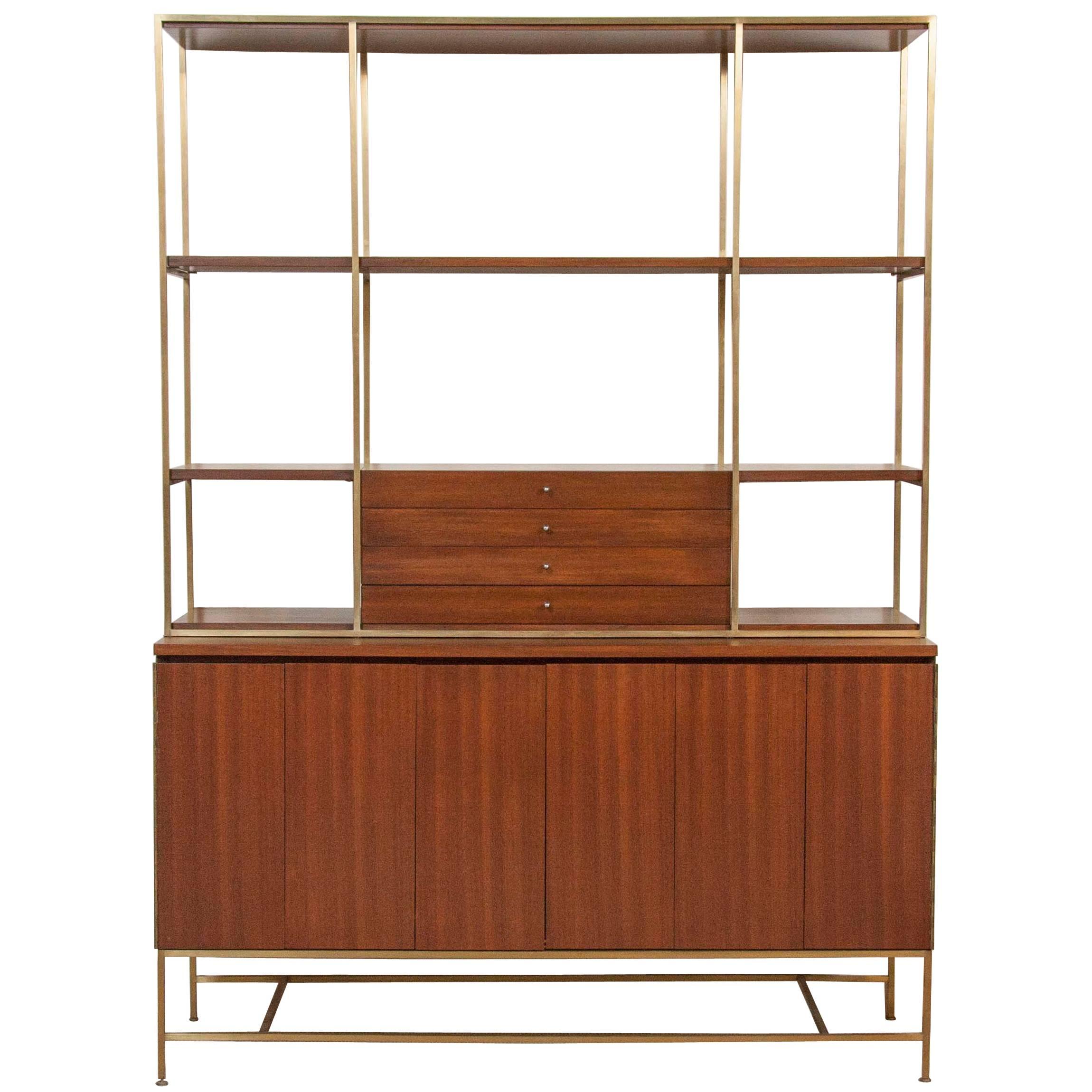A Paul McCobb Walnut And Brass Bookcase Produced By Calvin 