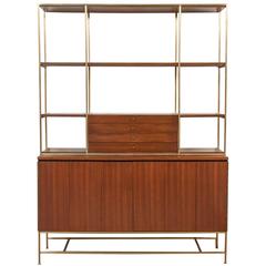 A Paul McCobb Walnut And Brass Bookcase Produced By Calvin 
