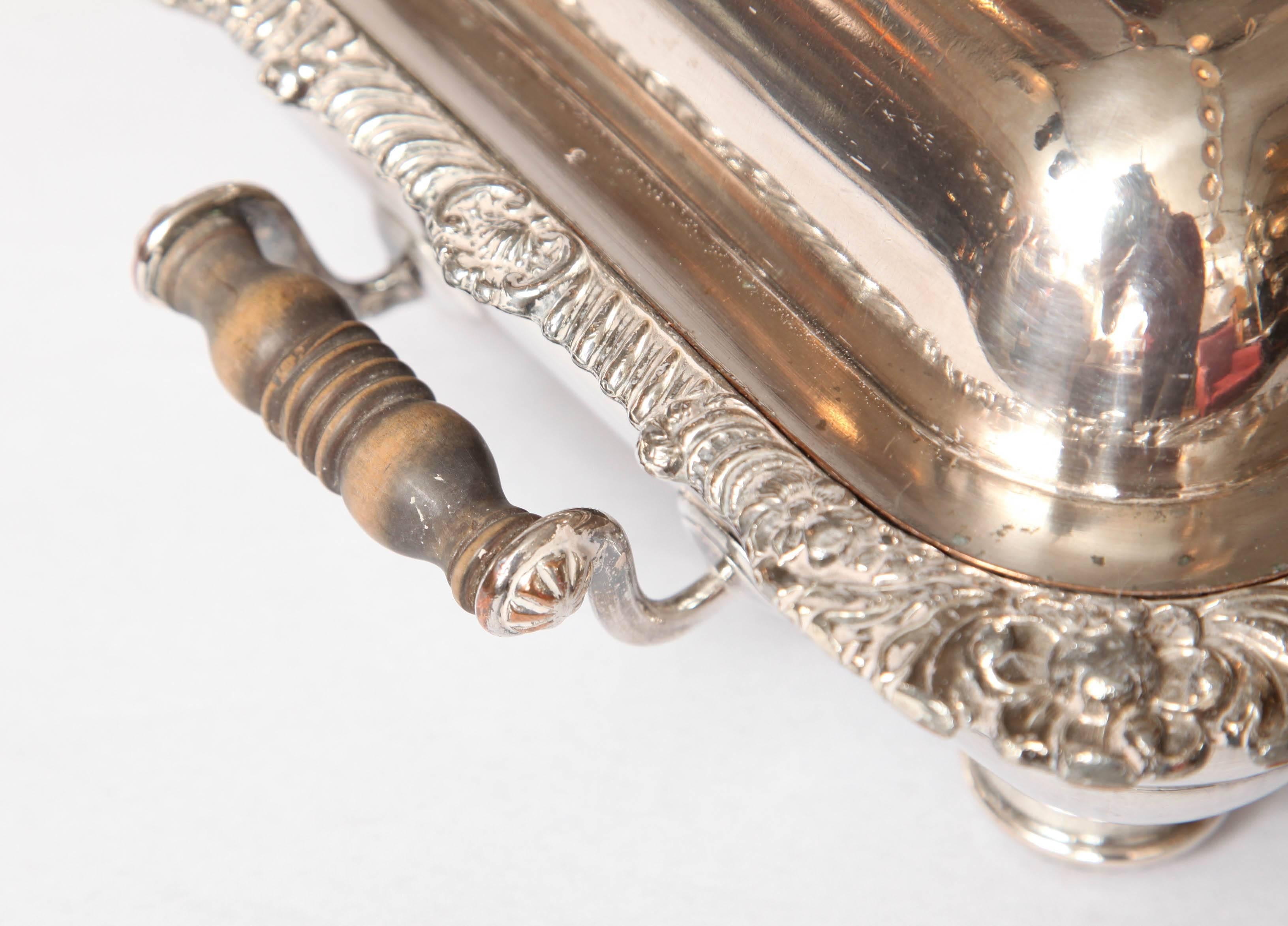 Silver serve-ware from a British Estate in the first half of the 19th century. 

Hand-picked by buyers at Ann-Morris, Inc.