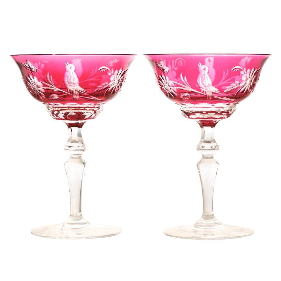 Val St. Lambert, Belgium, circa 1920s These 12 Val St. Lambert champagne goblets in cranberry are splendid. Renowned for sublime color, meticulous craftsmanship, and superb designs, Val stemware is regarded as some of the most magnificent ever made.