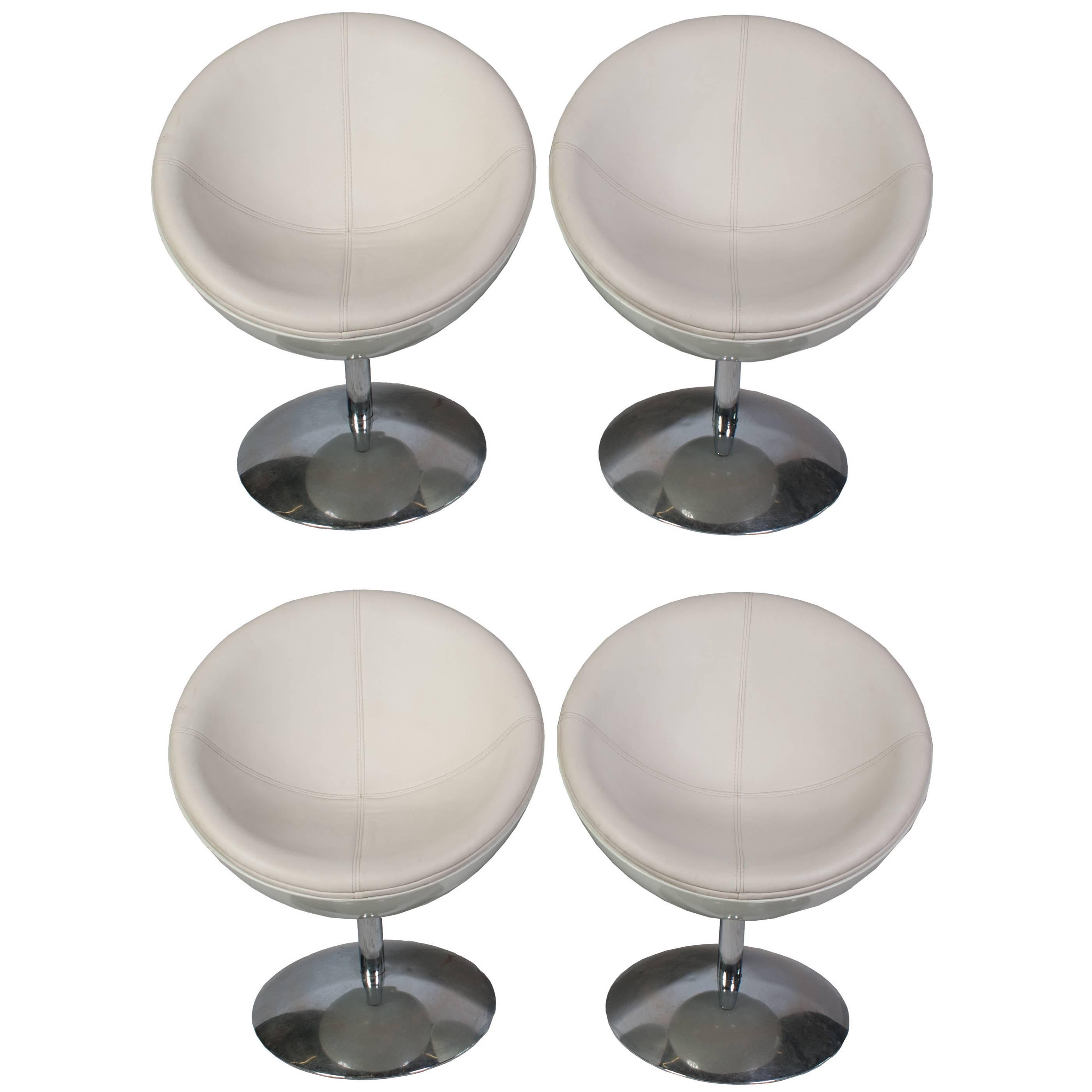 Set of Four Faux Leather Swivel Chairs and Polished Metal For Sale