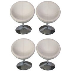 Set of Four Faux Leather Swivel Chairs and Polished Metal