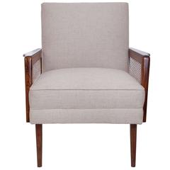 Midcentury Brazilian Caviuna Armchair Upholstered in Linen with Caned Sides