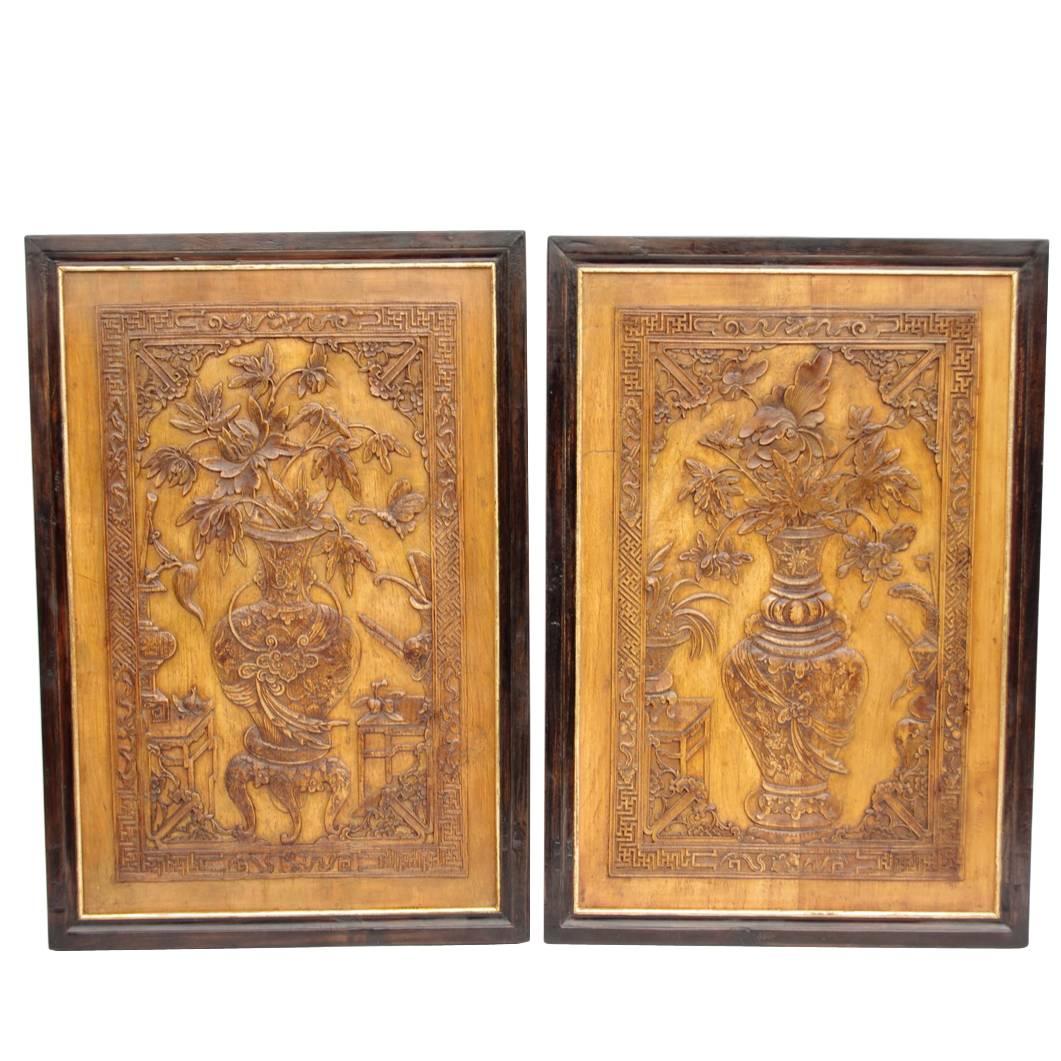 Pair of Asiatic style wood panels bas-relief, late 19th century