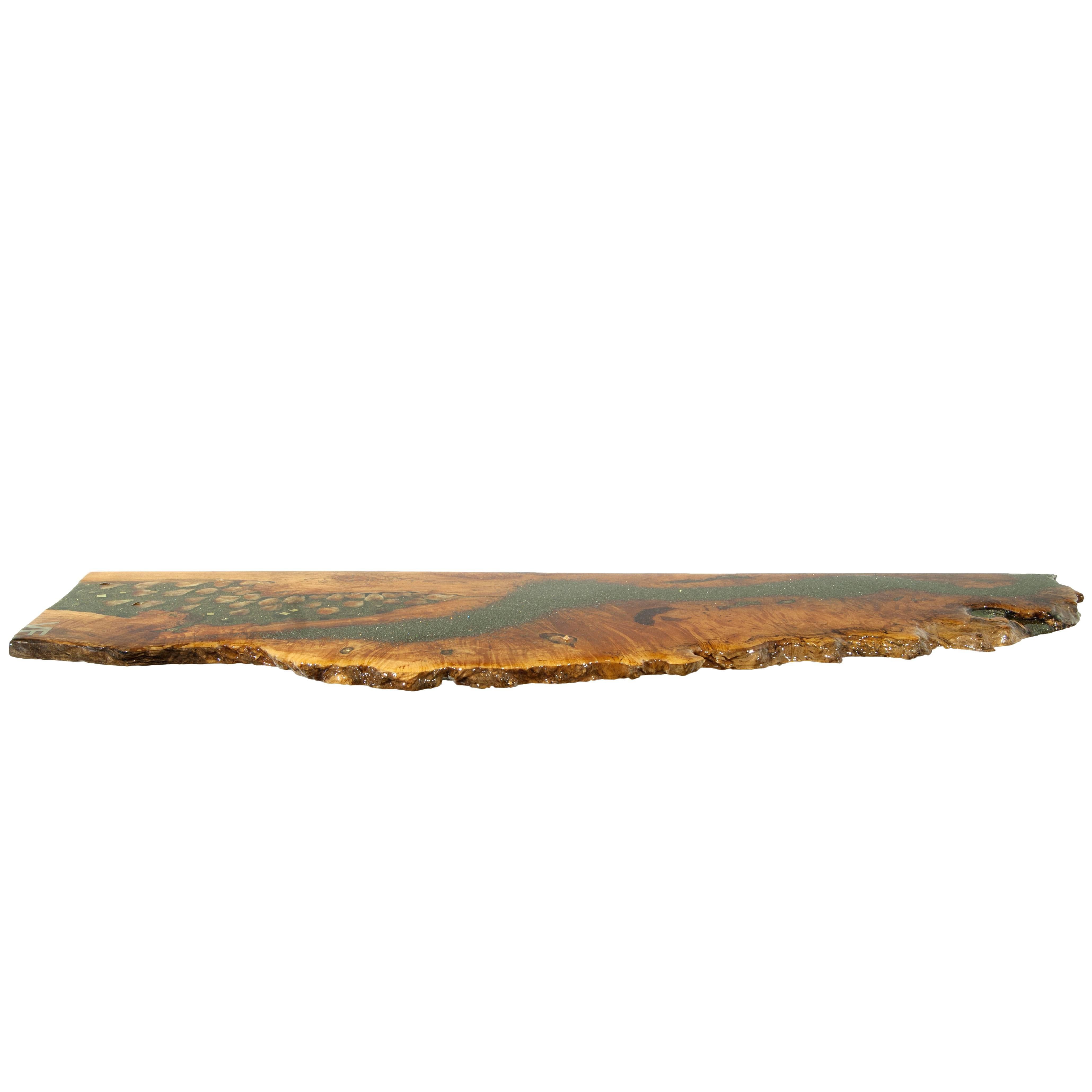 This stunning shelf in Big Leaf Burl Maple with crystal and gemstone inlay and a high gloss finish is stunning on any wall or entryway. Inlays of: Citrine, Emerald, Peridot, Pyrite, Rubelite, Tangerine quartz and Yellow apatite make the surface