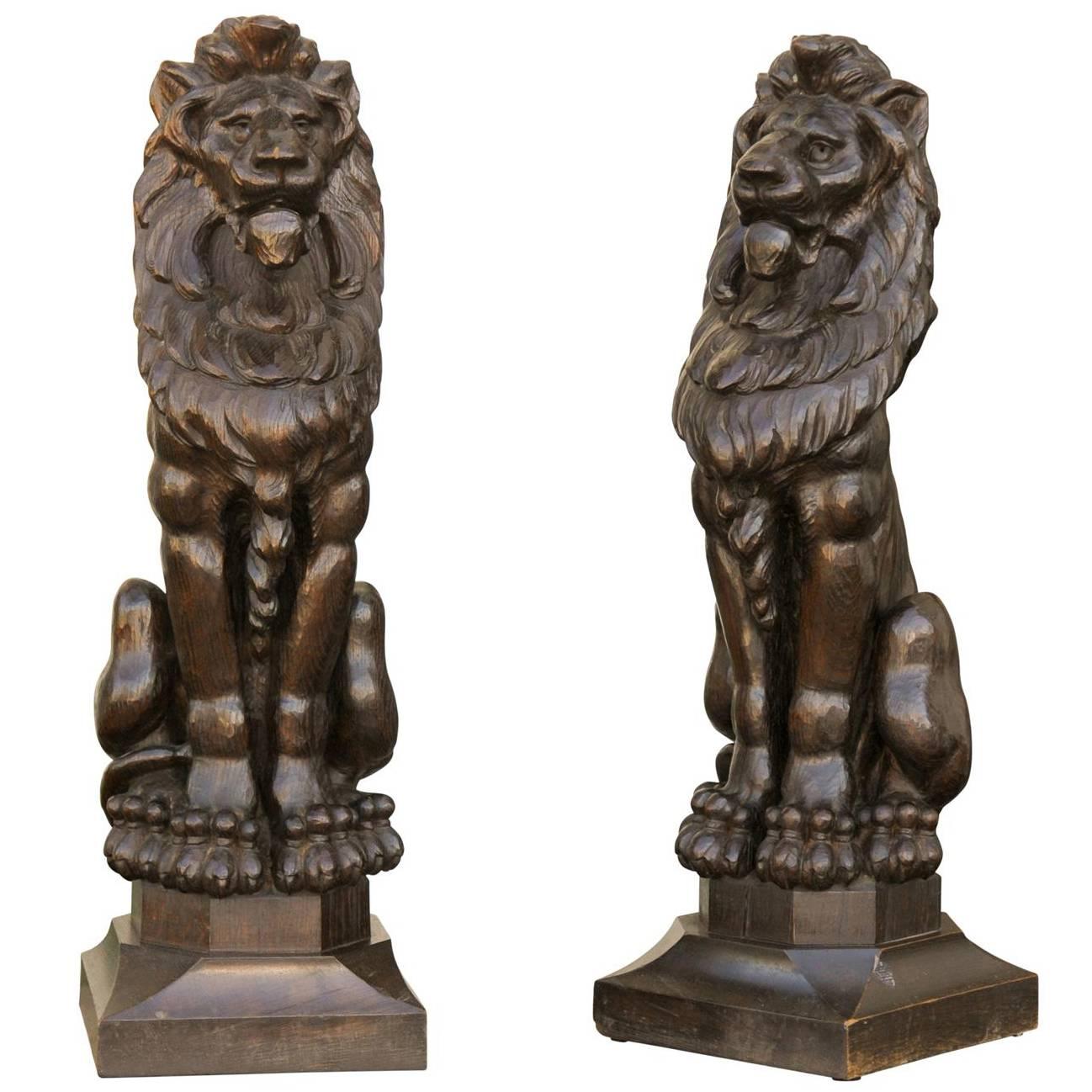 Pair of English Late 19th Century Large Wooden Carved Lions on Bases