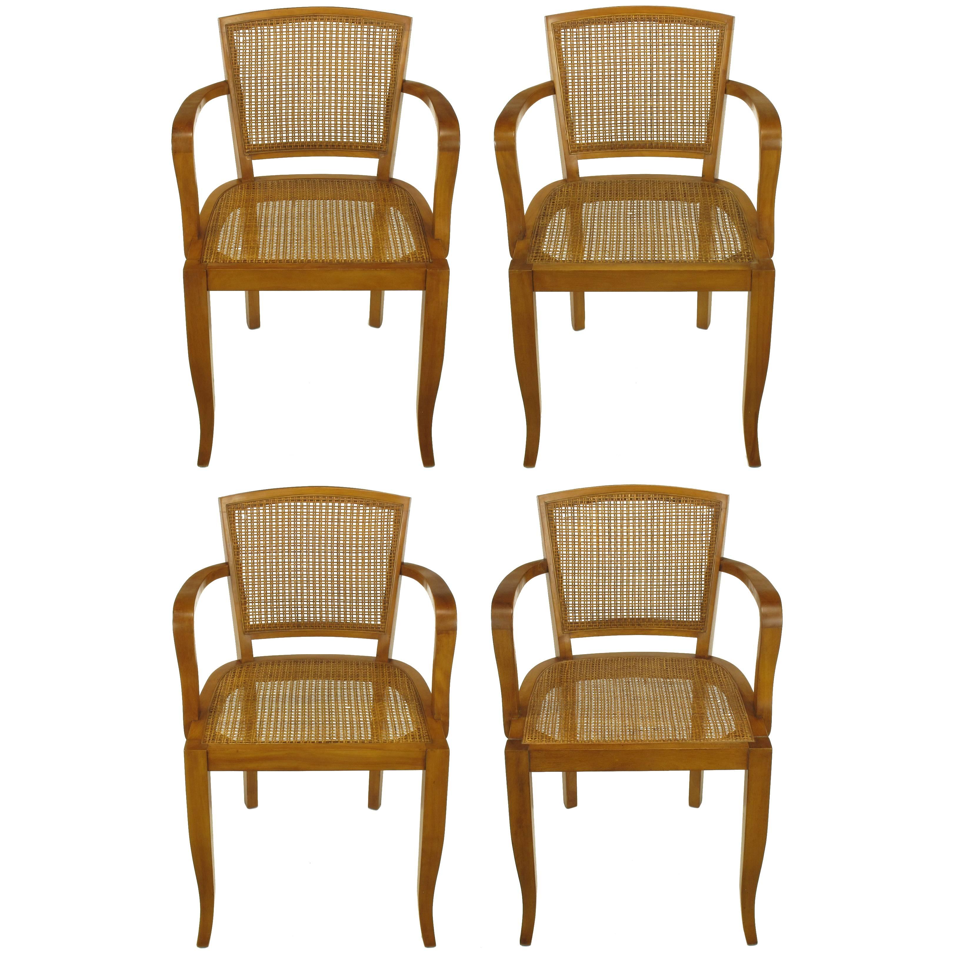 Four Classic Cherrywood and Cane Armchairs in the Style of Baker