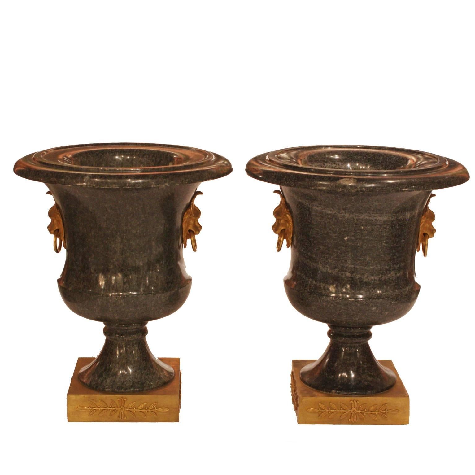 Pair of Large Neoclassical Green Granite and Gilt Bronze Urns