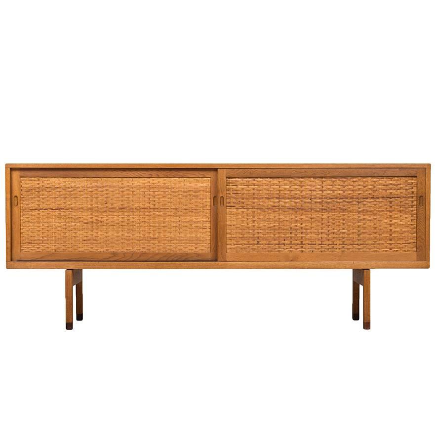 Hans Wegner Sideboard in Oak and Woven Cane by Ry møbler in Denmark