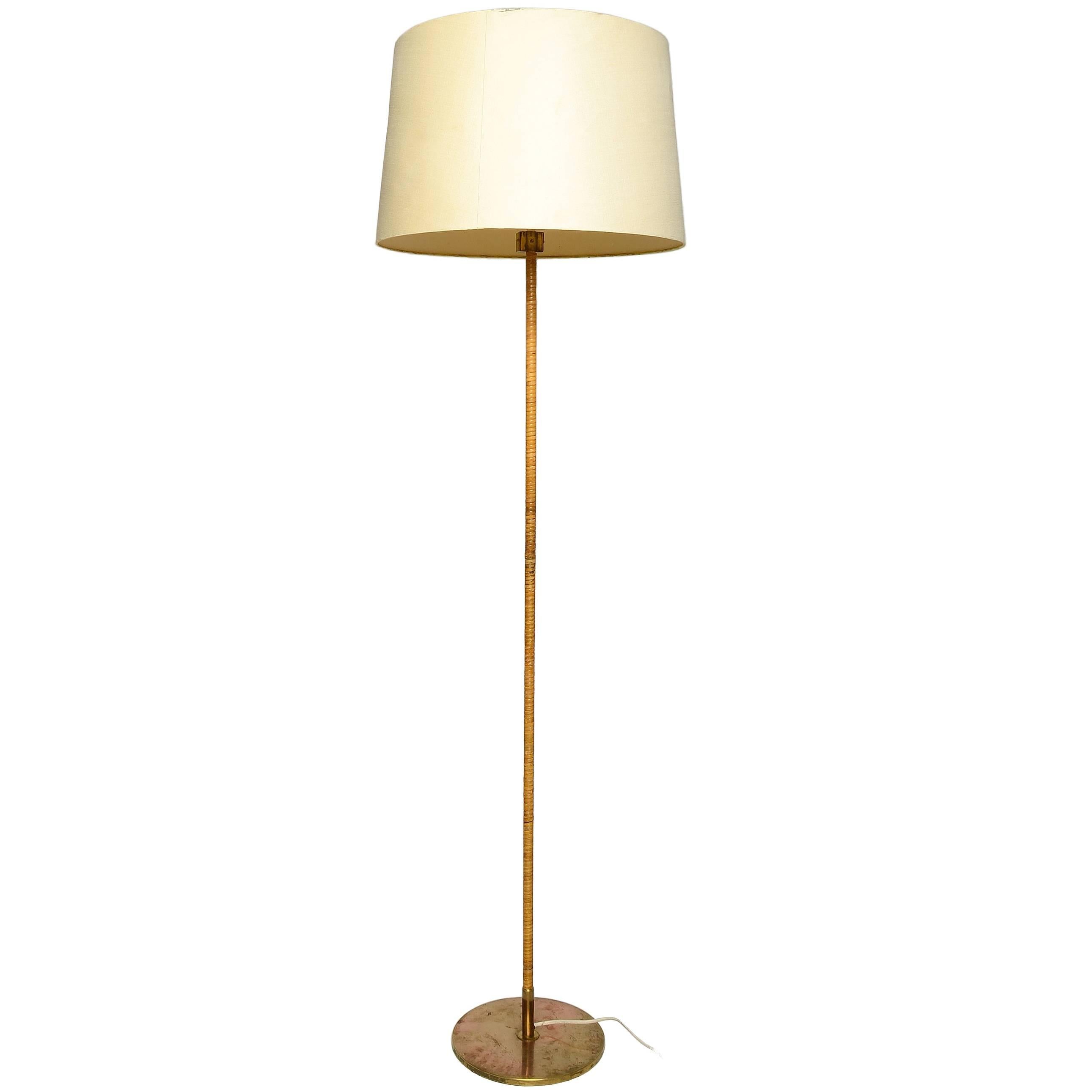 Paavo Tynell Floor Lamp in Brass and Cane