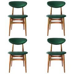 Set of Four Danish Teak Dining Chairs with Green Vinyl Backs and Seats