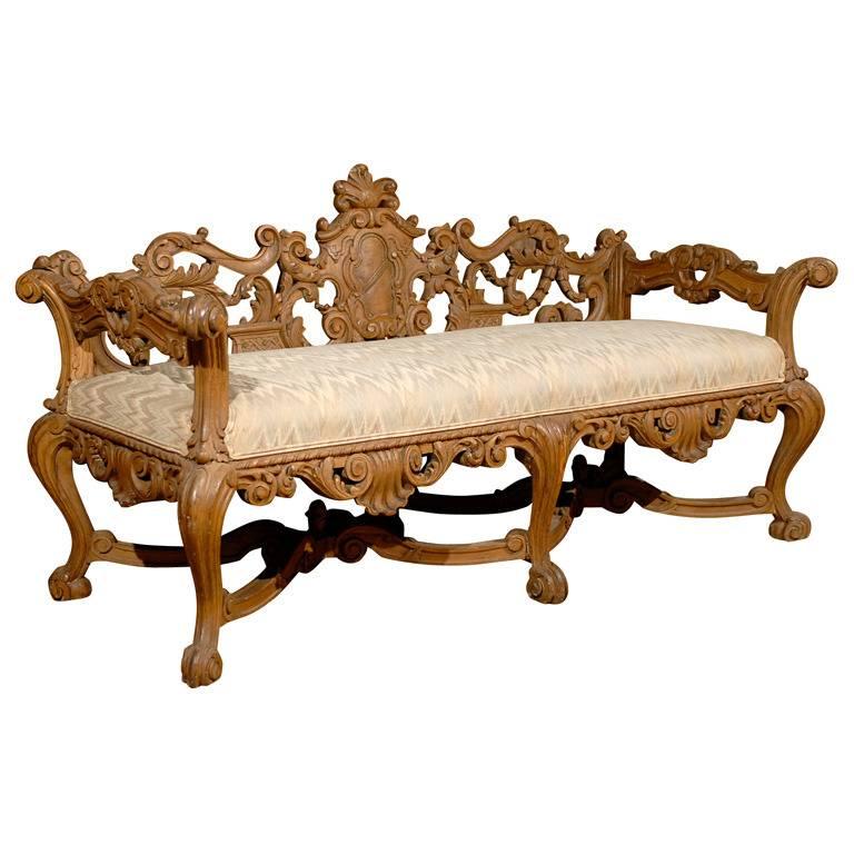 Late 19th Century Richly Carved Italian Wooden Bench with Upholstered Seat