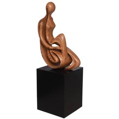 Large-Scale, Modern, Wooden Sculpture of Reclining Nude Female on a Black Base