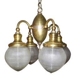1910s Original Brass Four-Light Dental Pendant Light with Clear Holophane Globes
