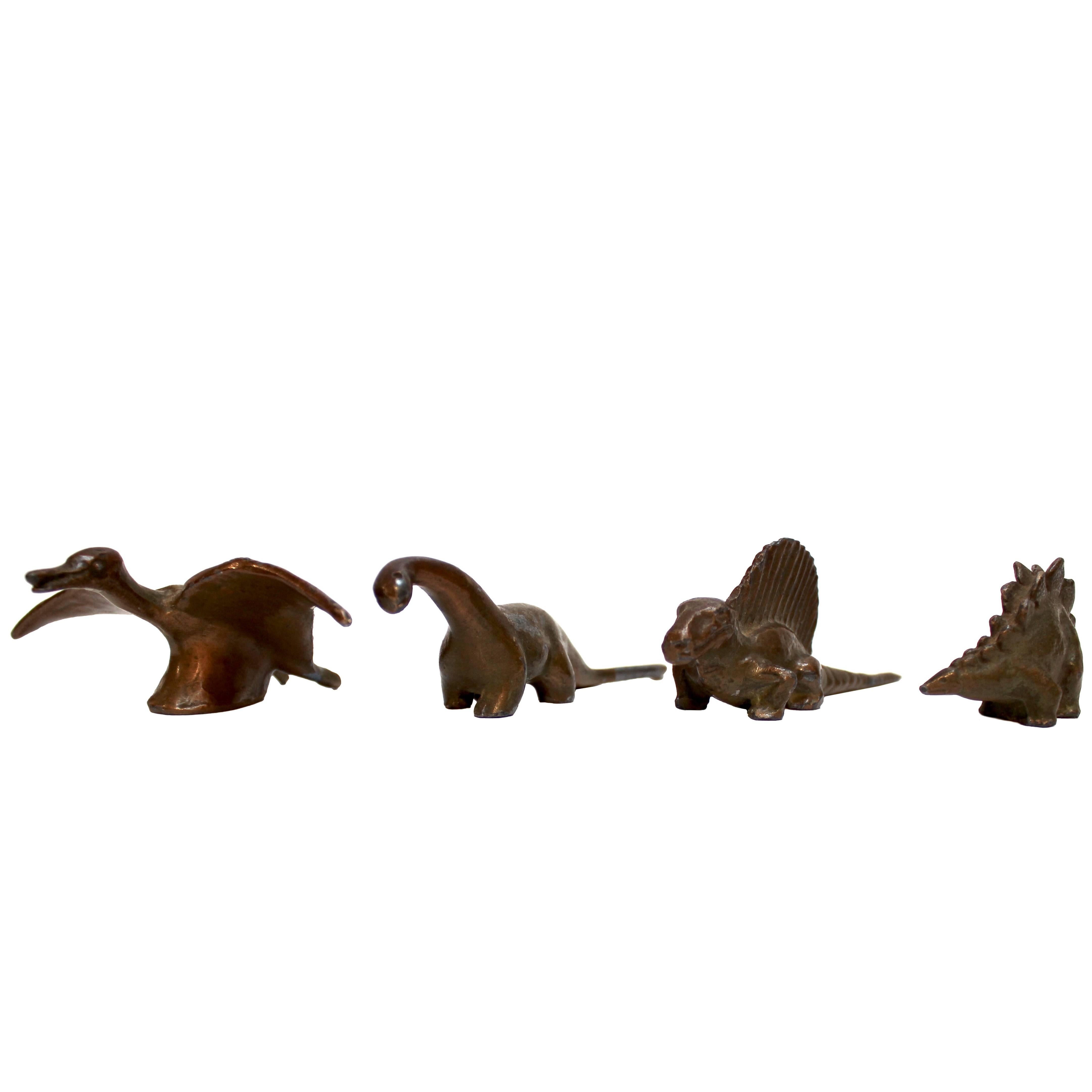 Set of Four 1947 Bronze Dinosaur Toys by Sell-Rite Gift Company