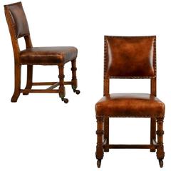 Pair of Patinated Leather and Carved Oak Side Chairs, England, circa 1900
