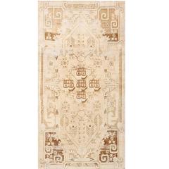 Soft and Muted Antique East Turkestan Khotan Rug