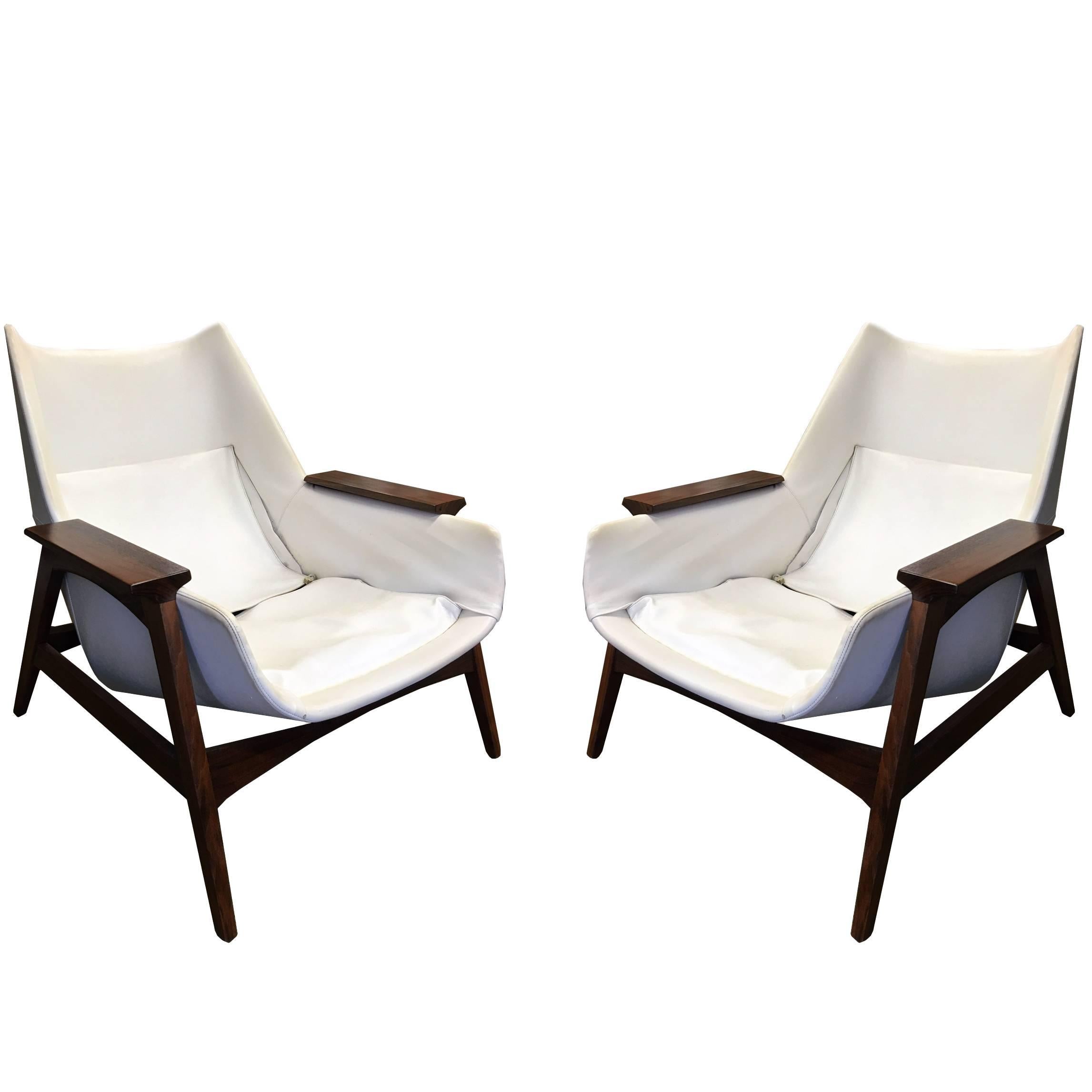 Pair of Mid-Century arm chairs and ottoman, in the style of Ico Parisi