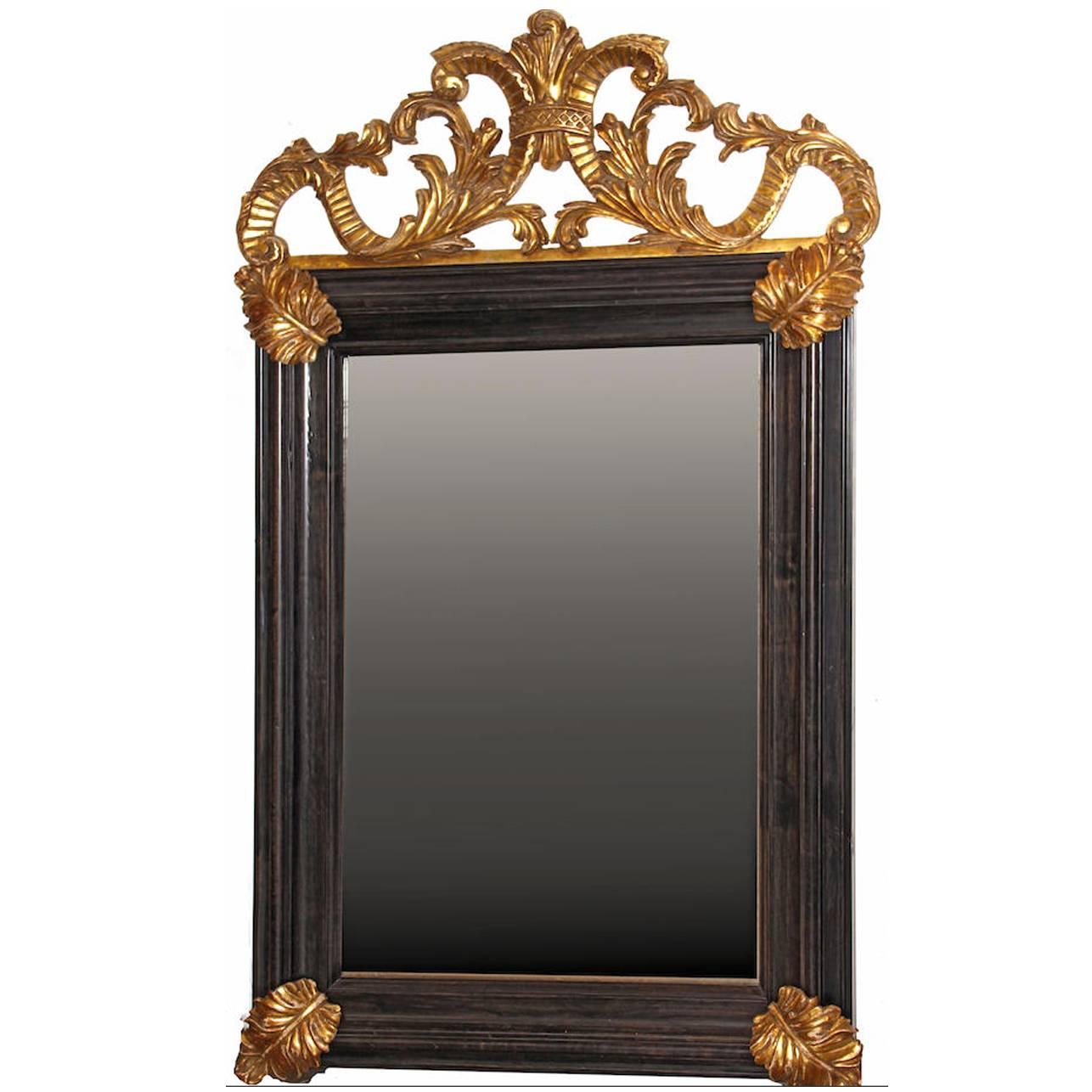 Italian baroque style  Mirror with hand-carved gilt details, aged mirror glass For Sale
