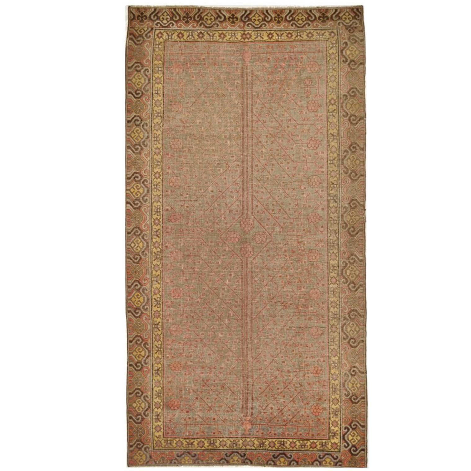 Antique Hand Knotted Wool Gallery Size Khotan Rug For Sale