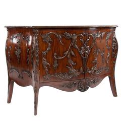 Exquisite 19th Century Carved Bombe Cabinet