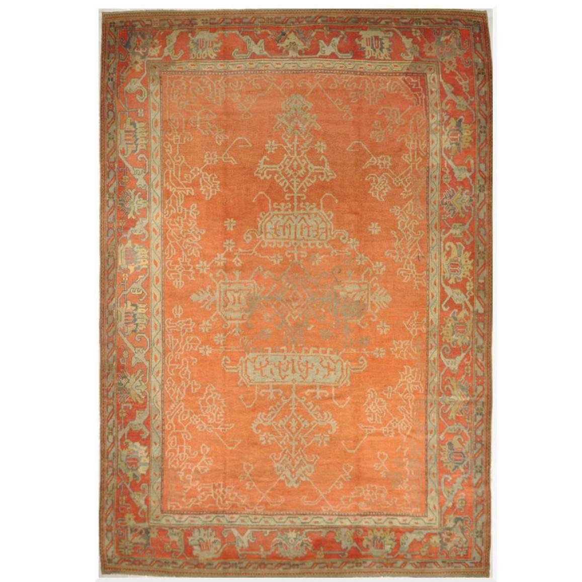 Large Antique Hand-Knotted Wool Coral Red Green Turkish Oushak Rug For Sale