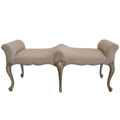Shapely French Louis XV Style Pale Green Painted and Parcel-Gilt Bench