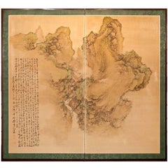 Paravent japonais à deux panneaux : paysage de montagne avec calligraphie