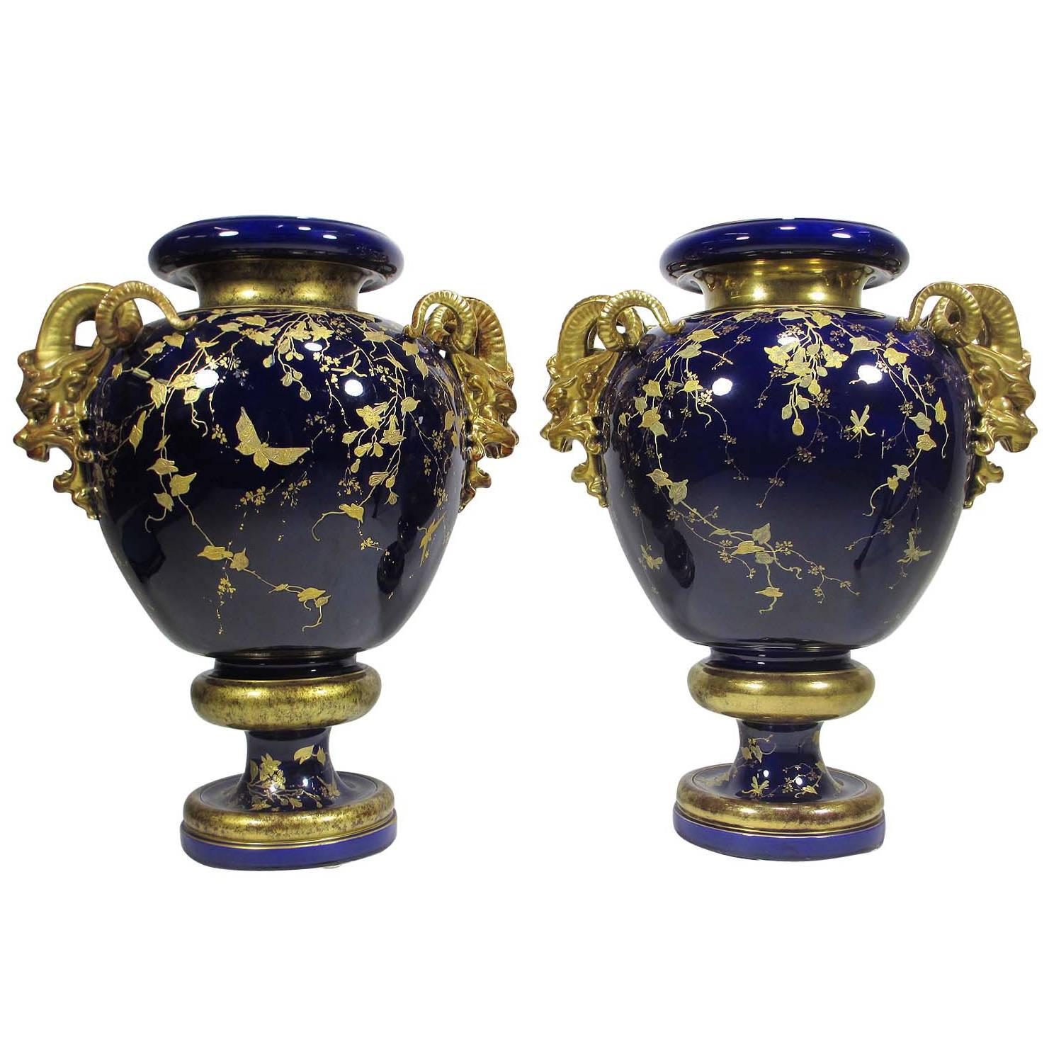 Fine Pair of 19th Century Cobalt-Blue and Parcel-Gilt Majolica Figural Vases For Sale