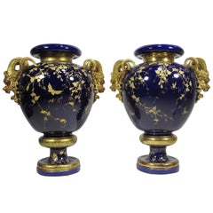 Fine Pair of 19th Century Cobalt-Blue and Parcel-Gilt Majolica Figural Vases
