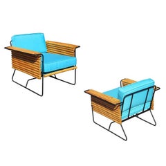 Used Restored Pair of Wroughtan Iron and Rattan Ski Club Chairs by Shirley Ritts