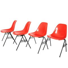 Red and Black Charles and Ray Eames DSS-N Side Chairs and Stacking Chairs 1950s 3
