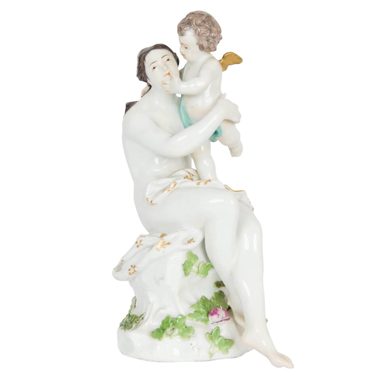 Antique German porcelain group of Venus with Cupid by Meissen
German, c. 1750
Height 20.5cm, width 11cm, depth 12cm

This charming Meissen porcelain figure depicts Venus and Cupid. The duo is presented in a format that brings to minds depictions of