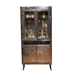 1950s English Polished Aluminum Glass Door Cabinet with Drawer and Lower Doors