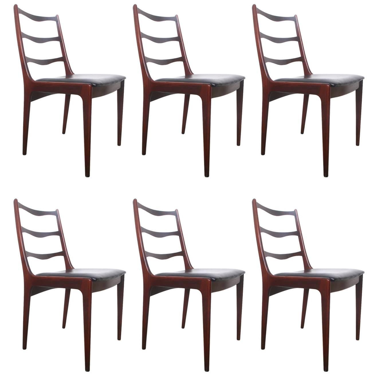 Six Rosewood Johannes Andersen Dining Chairs