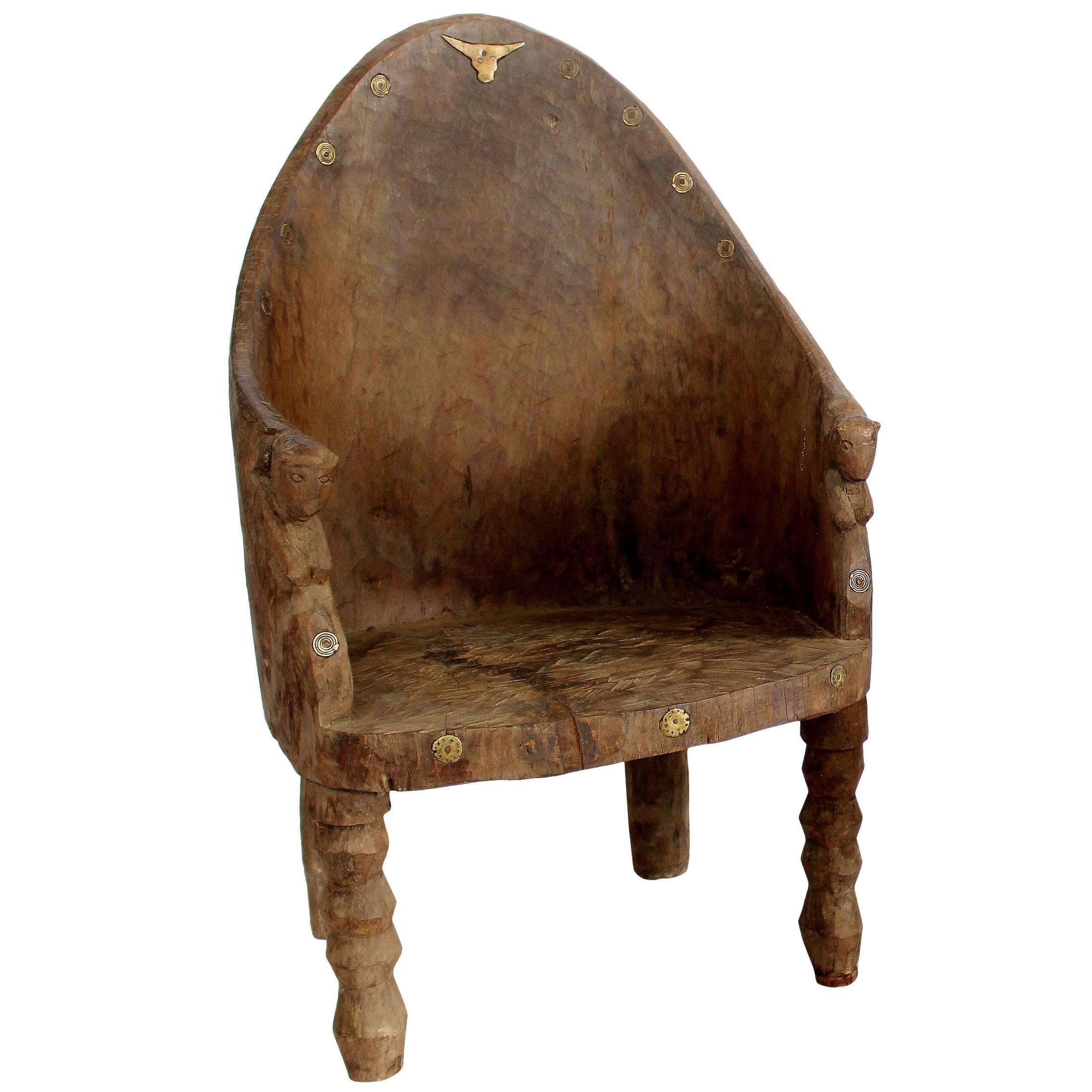 Important Carved Chair with Tiger and Mithun Head Decoration