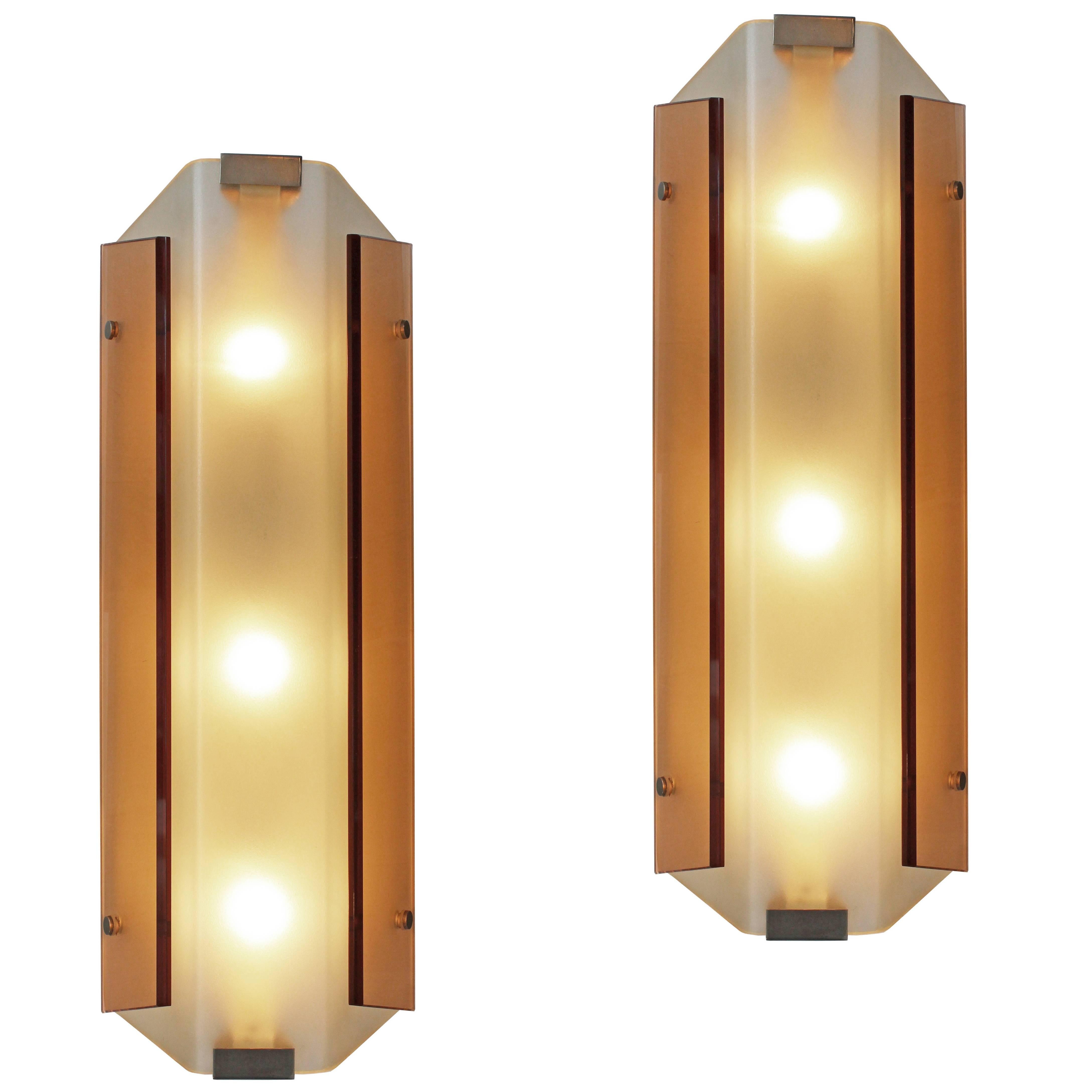 Rare pair of wall lights by Stilnovo