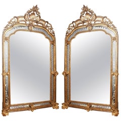 Monumental Pair of Period Louis XV Carved Giltwood Mirrors