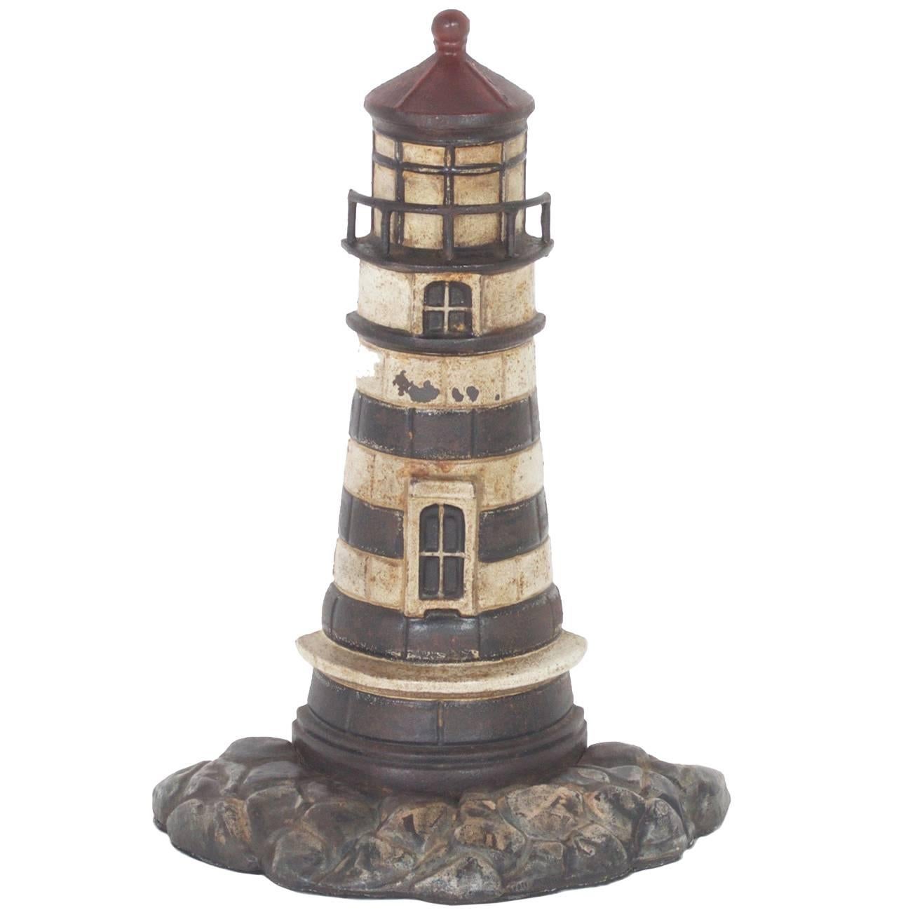 Antique Cast Iron Lighthouse Door Stop