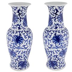 Pair of Chinese White and Blue Ceramic Vases with Floral Motifs 2