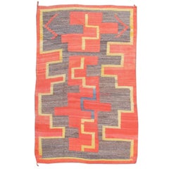 Late 19th Century Red, Yellow, and Brown Navajo Rug