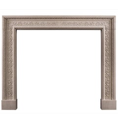 Carved English Stone Fireplace with Scrolled Detailing