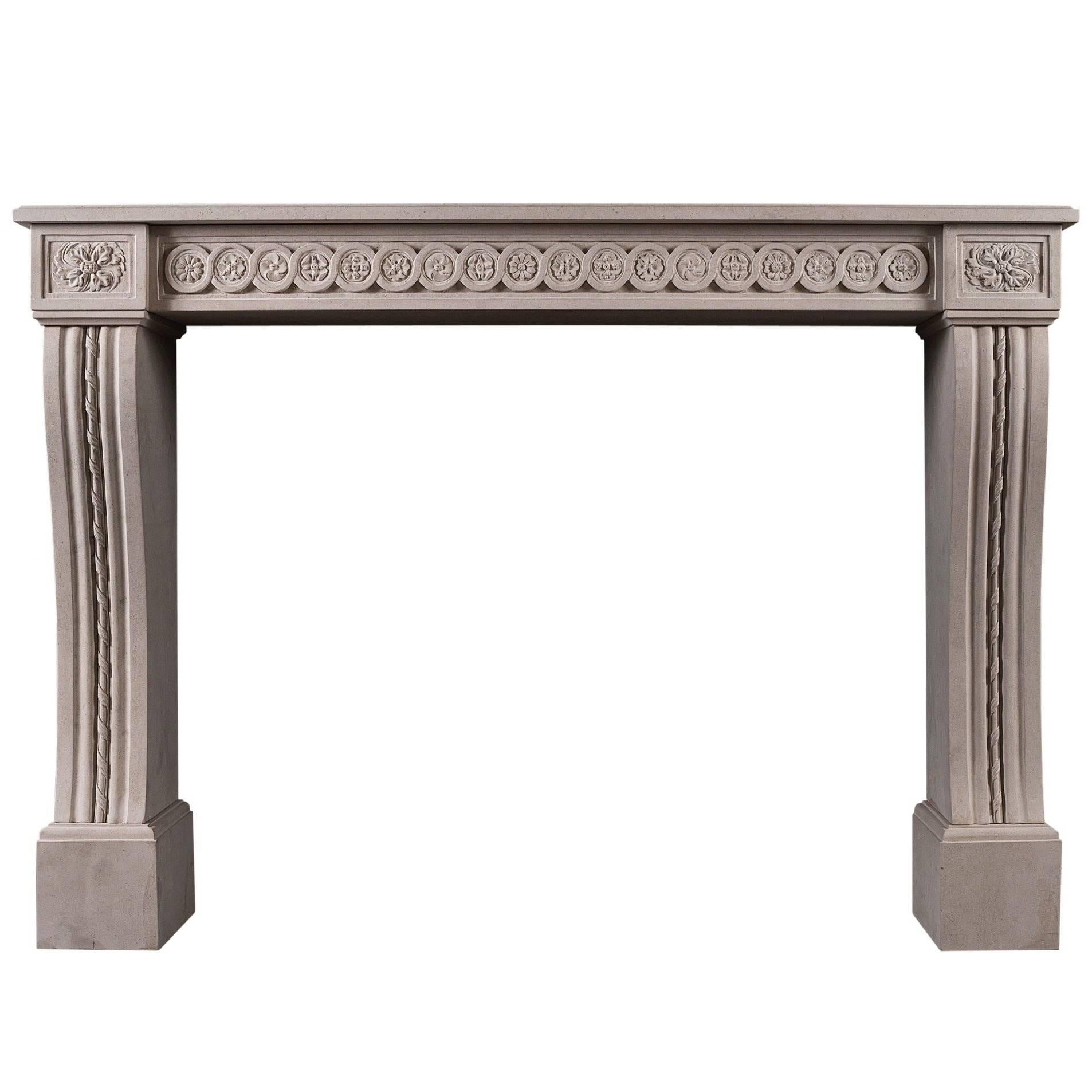 Carved Louis XVI Style Limestone Fireplace For Sale