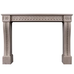 Carved Louis XVI Style Limestone Fireplace