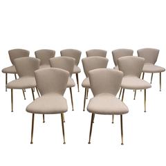 12 dining chairs by Louis Sognot for ARFLEX, 1959. Brass legs, Upholstery restored