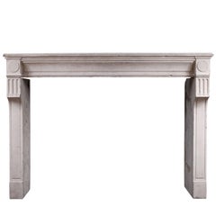 Rustic 18th Century French Louis XVI Limestone Fireplace