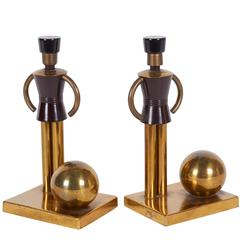 Walter Von Nessen Figural Bookends in Brass and Bakelite