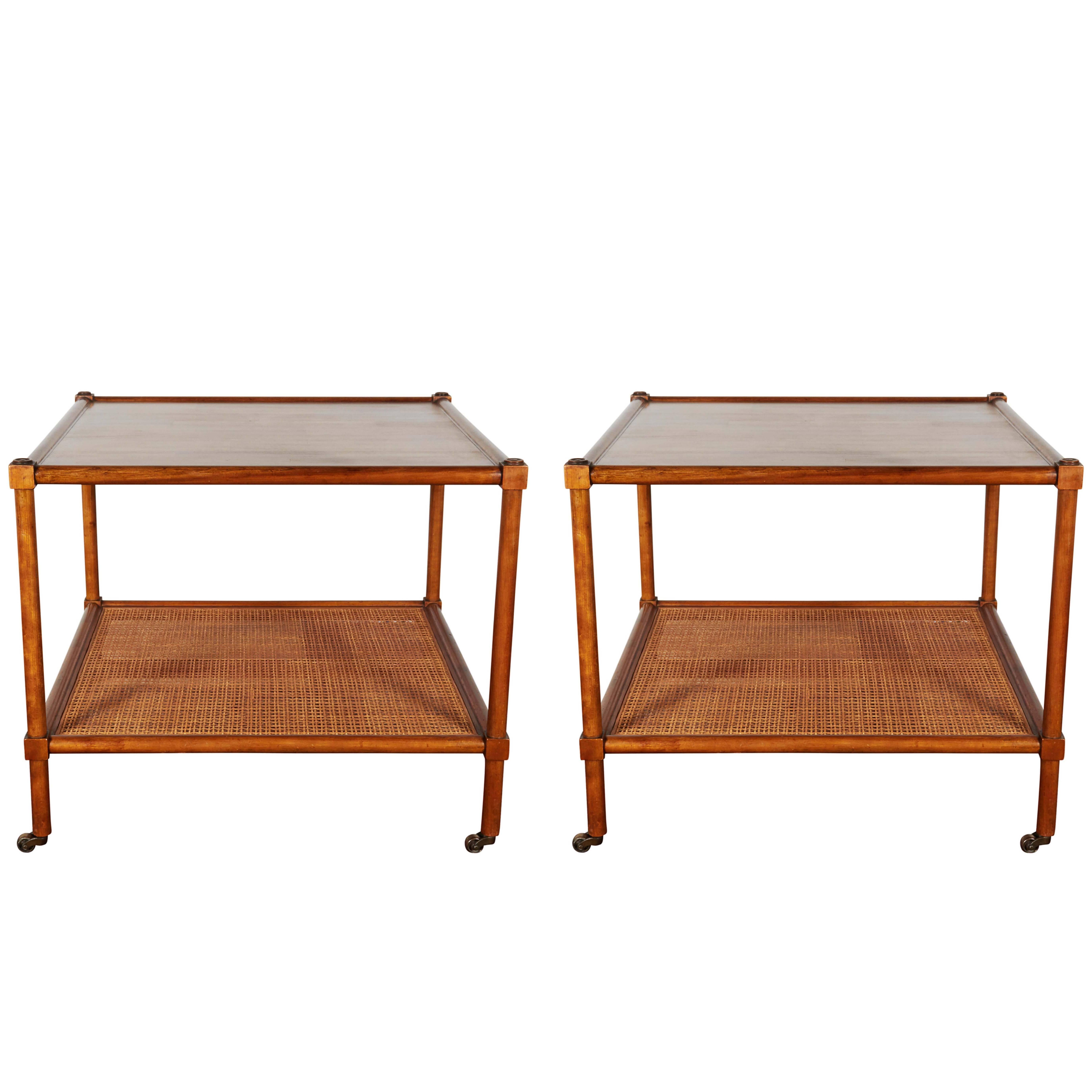 Pair of Baker Rolling Tables with Cane Shelf